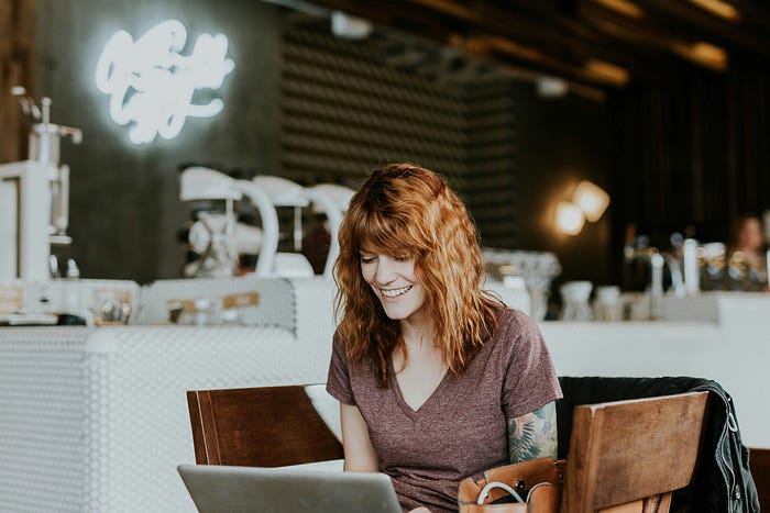 Elated Woman, Feeling Energized After Task Offload