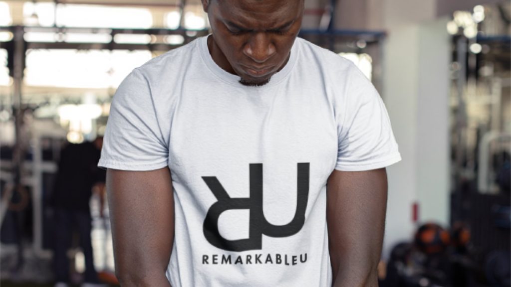 remarkableu merch shirt worn by strong bodybuilder man